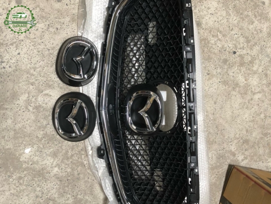 Mặt ga lăng Mazda 